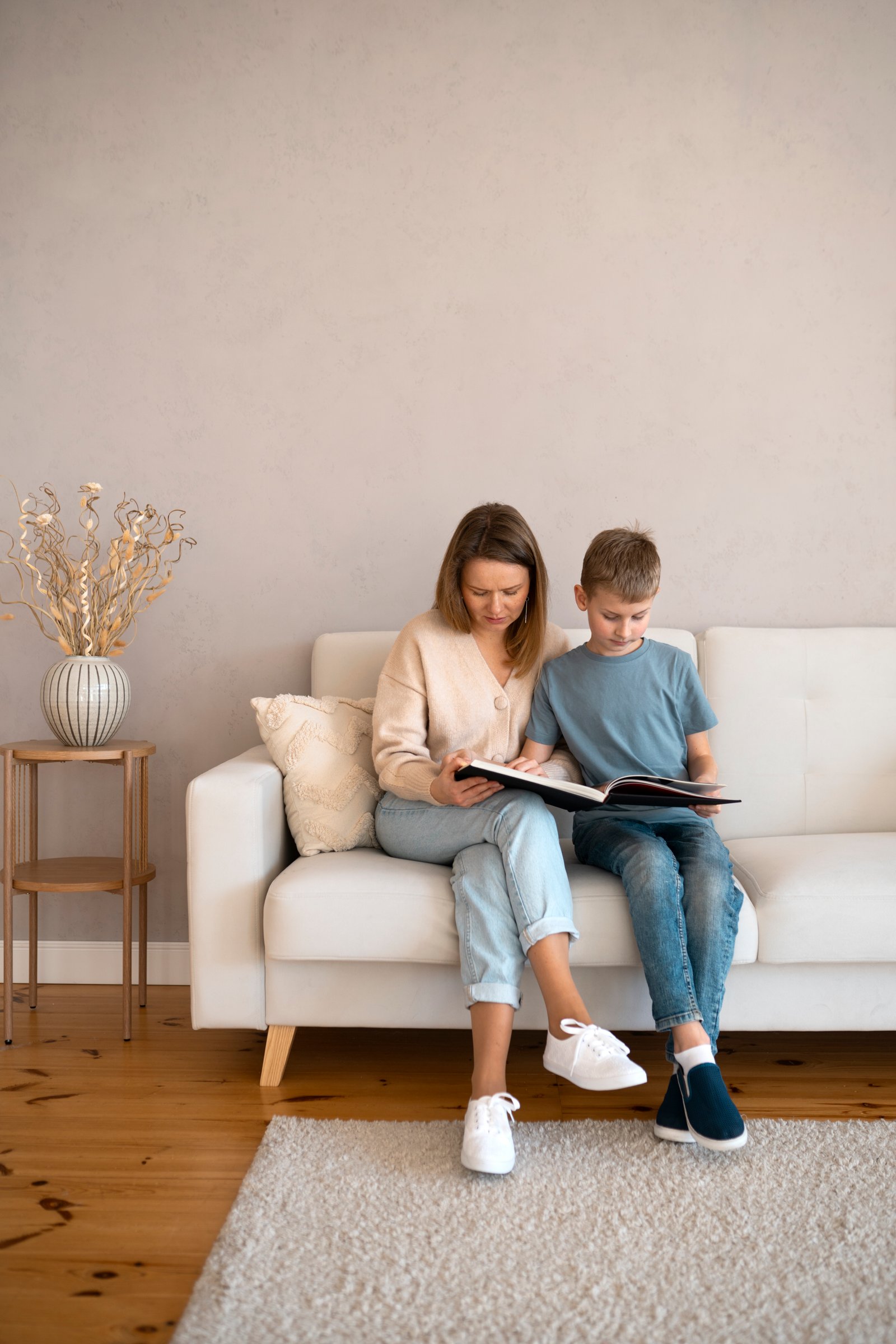 A family relaxing in a bright, clean living room